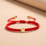 Exclusive:  Red String Heart Bracelet